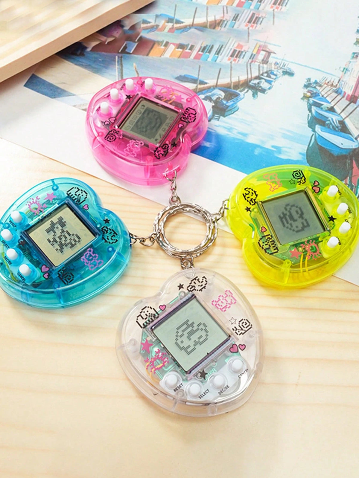 1pc/2PCS/4PCS Mini Virtual Pet Game Console,Personalize The Heart-Shaped Look In A Transparent Color,Portable Design (Can Be Used As A Keychain/Bag Pendant),An Educational Toy For Children To Raise An
