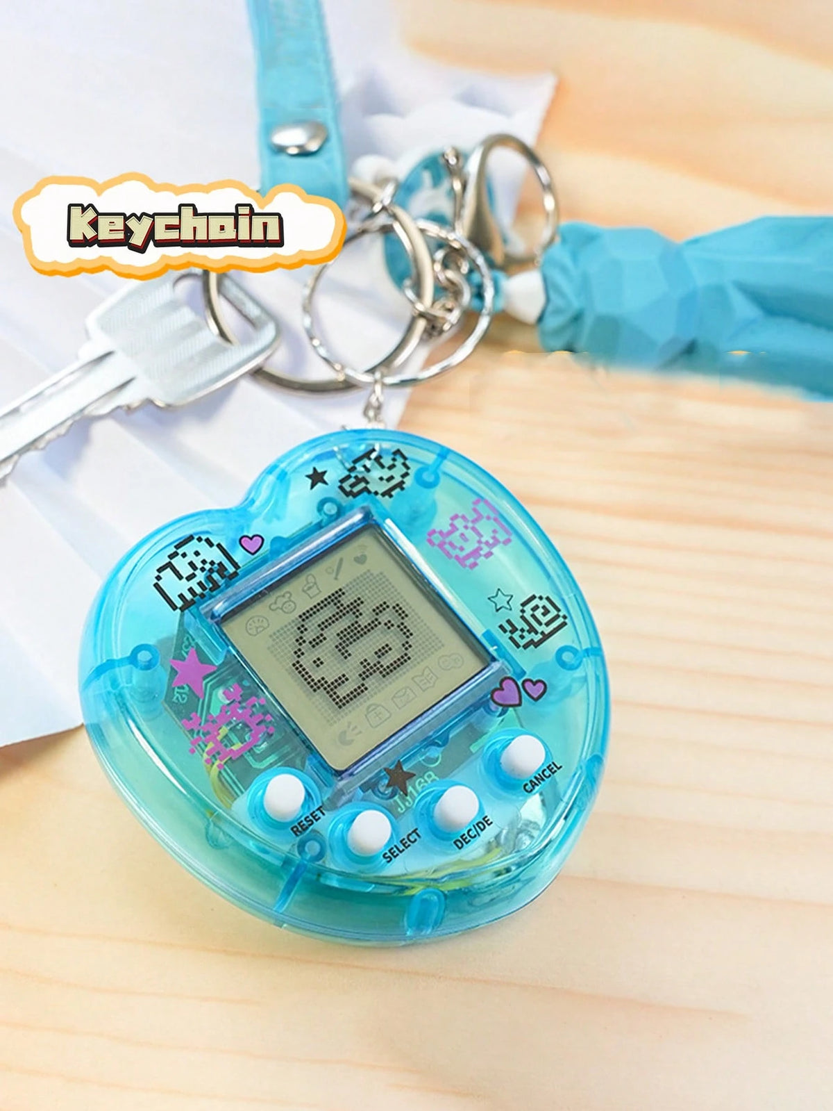 1pc/2PCS/4PCS Mini Virtual Pet Game Console,Personalize The Heart-Shaped Look In A Transparent Color,Portable Design (Can Be Used As A Keychain/Bag Pendant),An Educational Toy For Children To Raise An