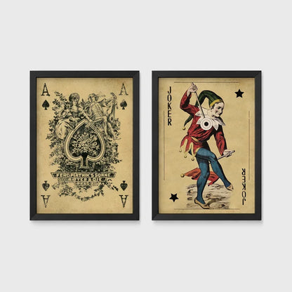 Set of 2 framed prints, vintage oversized playing cards: an ornate Ace of Spades; and a Joker — unframed