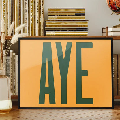 Aye Typography Quote Print - Forest Green framed on a living room bookshelf