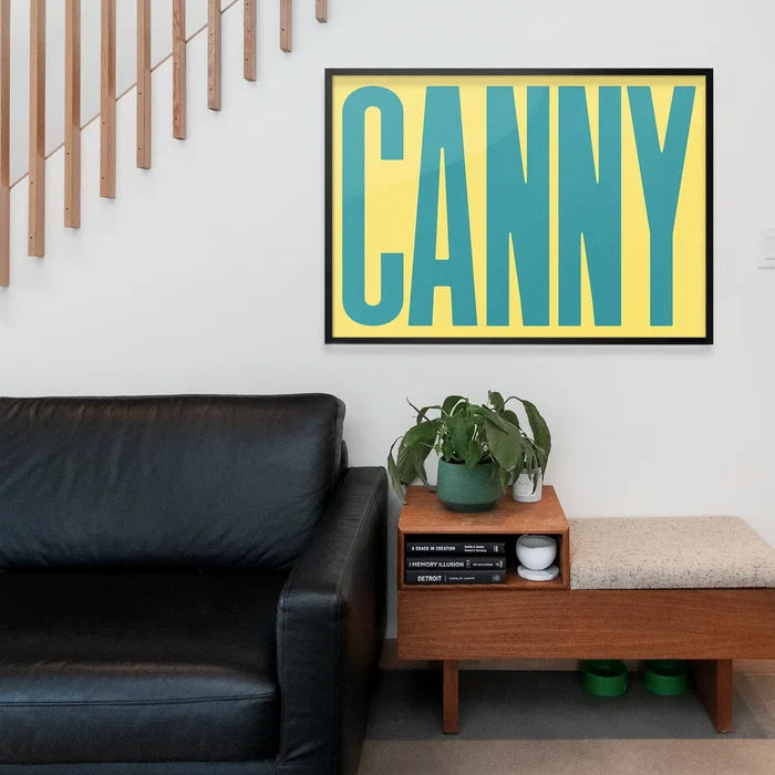 Canny Typography Quote Print - Duck Egg Blue framed above a living room sofa