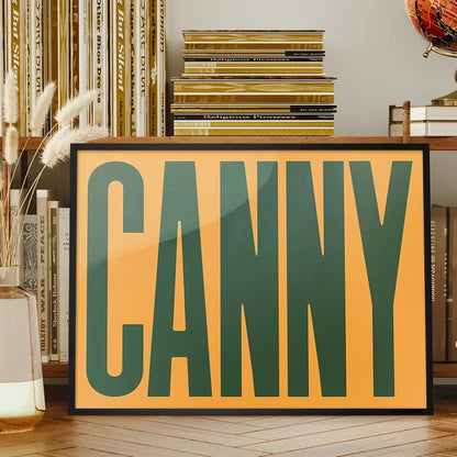 Canny Typography Quote Print - Forest Green framed on a living room bookshelf