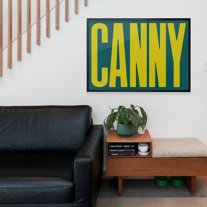 Canny Typography Quote Print - Lime Green framed above a living room sofa