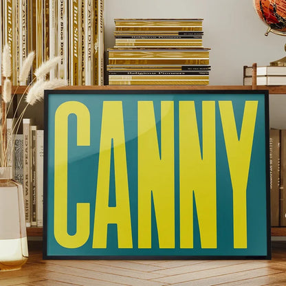 Canny Typography Quote Print - Lime Green framed on a living room bookshelf