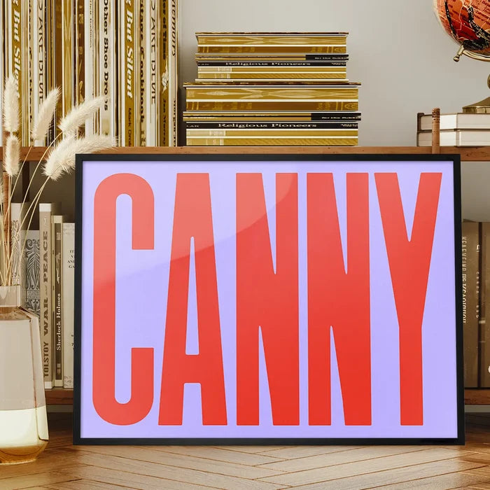 Canny Typography Quote Print - Red framed on a living room bookshelf