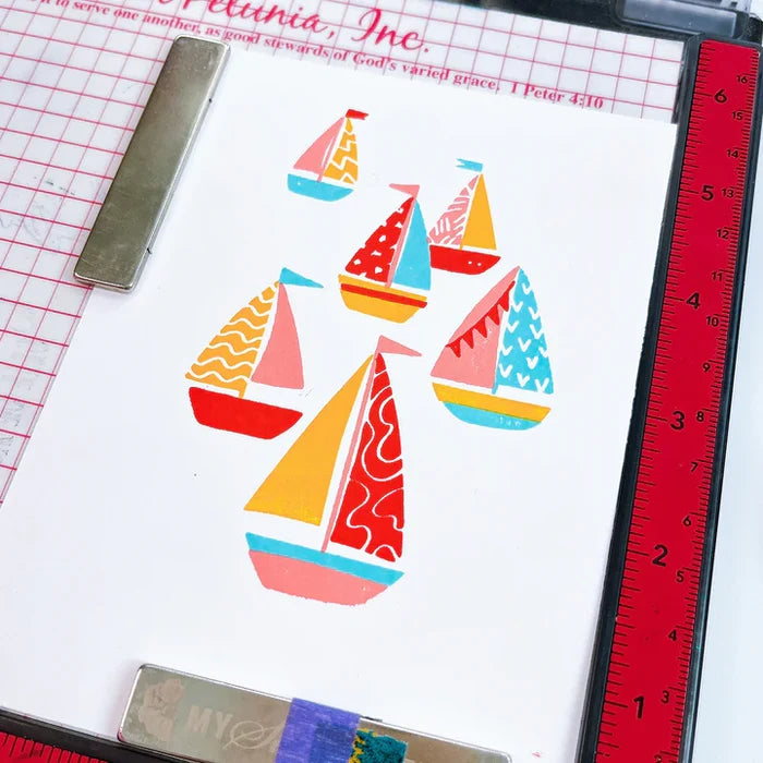 Catherine Pooler - Stamp Set - Sail Away. Create a colorful sailboat scene with the Sail Away 6x8 Stamp Set. This 4 step layering set will allow you to mix and match color combos to create 6 sailboats. Available at Embellish Away located in Bowmanville Ontario Canada.