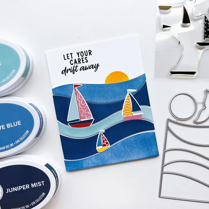 Catherine Pooler - Stamp Set - Sail Away. Create a colorful sailboat scene with the Sail Away 6x8 Stamp Set. This 4 step layering set will allow you to mix and match color combos to create 6 sailboats. Available at Embellish Away located in Bowmanville Ontario Canada. Example by brand ambassador.