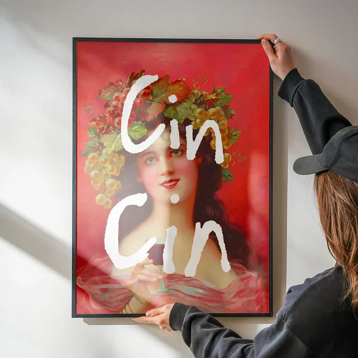 Cin Cin Quote Painting Print being hung on a wall in a black frame