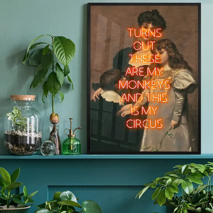 Circus Monkeys Quote Print black framed on a living room shelf
