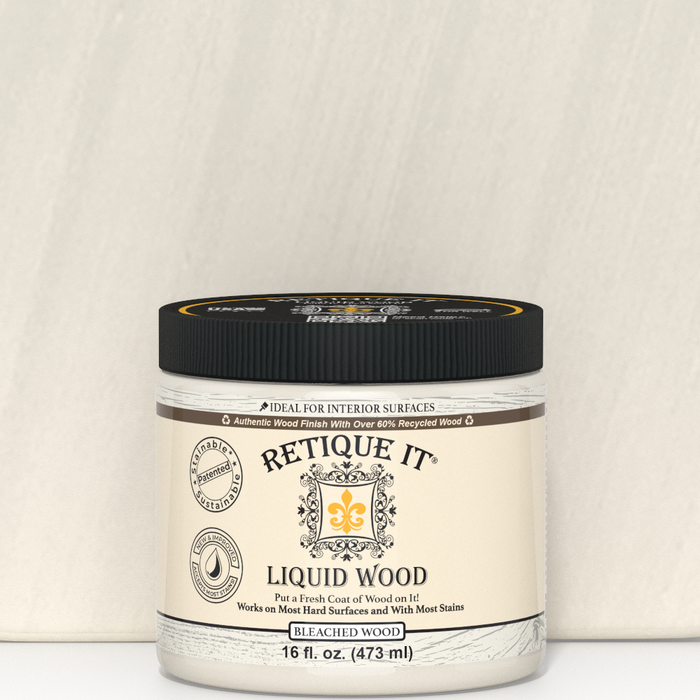 Close-up of 16oz bottle of Retique It Liquid Wood in Bleached for interior use, showing the product label and packaging.