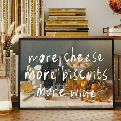 More Cheese Biscuits Wine Quote Print framed on a living room bookshelf