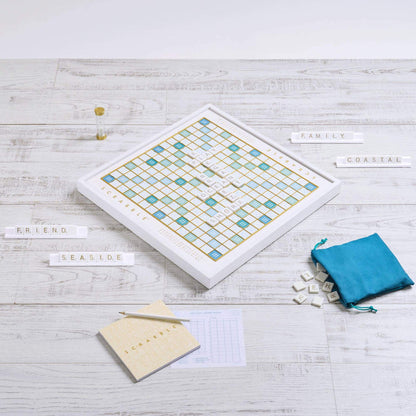 Board game with tiles and cards on a wooden surface