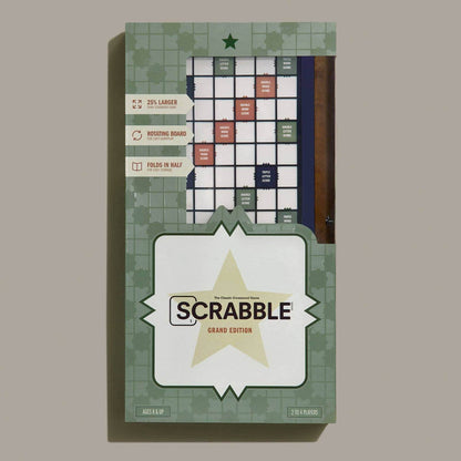 Scrabble Grand edition box with star design on a beige background