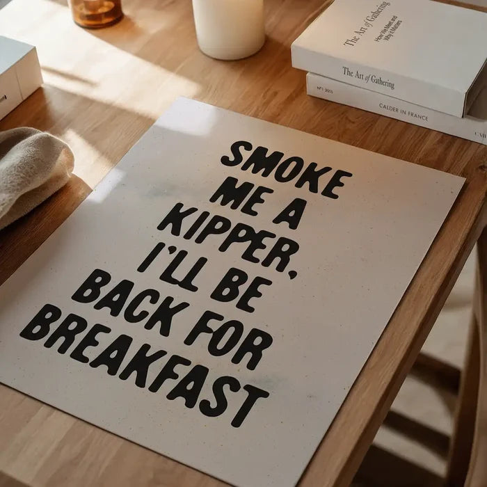 Smoke Me A Kipper Quote Print unframed on a home office desk