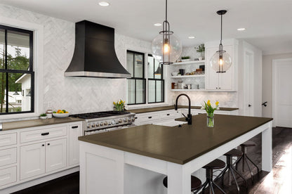 Retique It black walnut wood finish kit applied to a kitchen countertop with a smooth, polished surface.