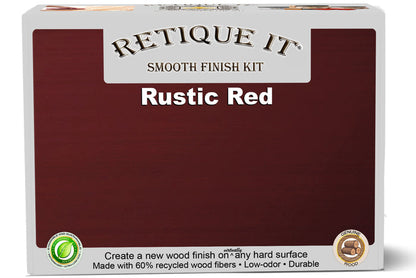 Retique It Smooth Finish Kit in Rustic Red for wood finishing, featuring brushes and tools on a wooden surface.