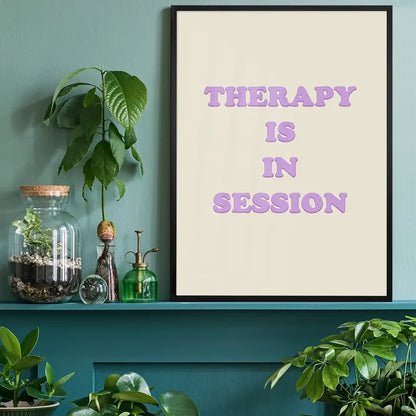 Therapy In Session Quote Print black framed on a living room shelf
