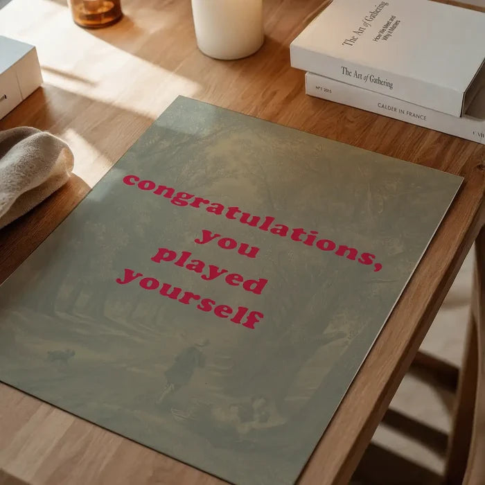 You Played Yourself Quote Print unframed on a home office desk